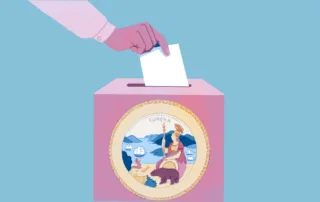 A hand places a ballot into a pink ballot box featuring the seal of california, set against a light blue background.