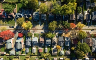 Aerial view of a well-organized suburban neighborhood during autumn