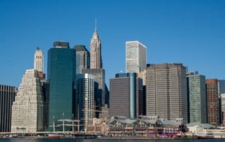 Manhattan skyline with high-rises and historical maritime structures