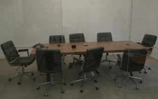 Modern office conference room viewed through glass walls