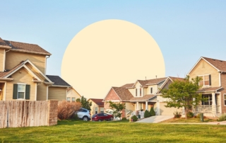 Suburban neighborhood with modern houses and sunny sky