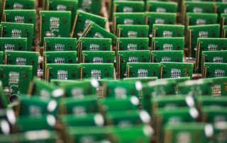 Close-up of printed circuit boards in assembly