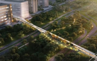 Modern pedestrian bridge with integrated greenery