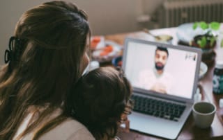 Woman and child in telemedicine consultation