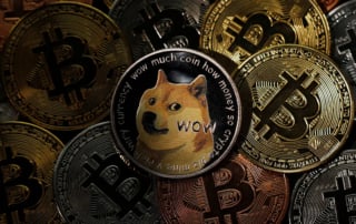 Physical representation of bitcoin and dogecoin coins