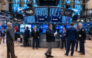 Nyse trading floor with traders and stock tickers