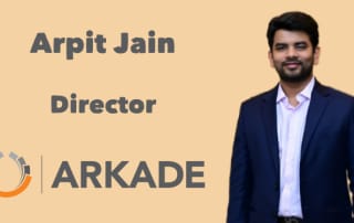 Image of arpit jain, director at arkade, in a navy blue suit
