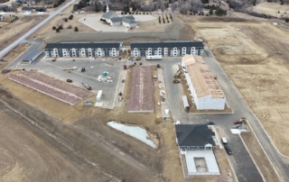 Aerial view of a construction site for multifamily housing