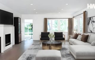 Modern living room with virtual staging, featuring neutral tones, sleek furniture, and natural light