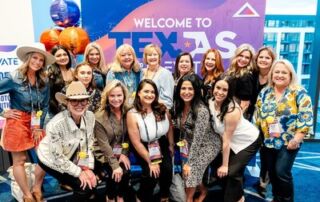 Group of people posing indoors in front of a "welcome to texas" backdrop