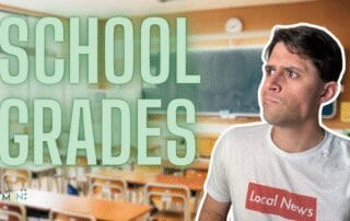 A classroom with wooden desks, chairs, and a blackboard, featuring large green letters reading 'school grades,' and a concerned person in a 'local news' t-shirt.