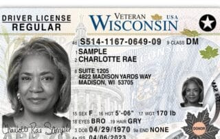 Image of a wisconsin real id driver's license for charlotte rae sample, a veteran, with a star indicating real id compliance.