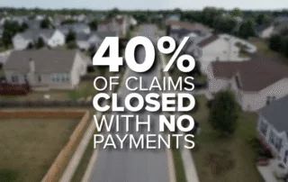 40% of insurance claims closed with no payments text over an aerial view of a suburban neighborhood street