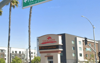 Sign for los alamitos race course near race track road in the city of cypress