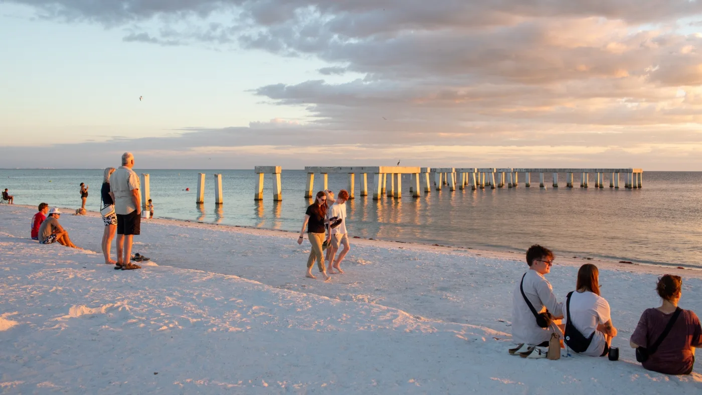 Fort myers beach pier and sunset