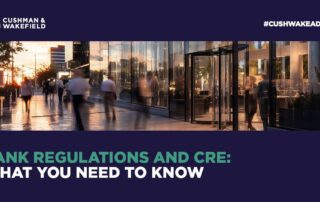 Bank Regulations Are Shifting — How New Fdic Rules Are Reshaping Commercial Real Estate 3 Bank regulations and cre: what you need to know – cushman & wakefield graphic with people walking outside a modern glass office building at sunset.