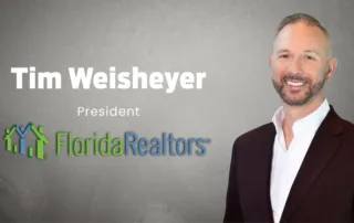 Smiling man in a suit beside text that reads ‘tim weisheyer – president – florida realtors’ on a gray background