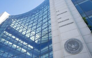 Modern glass facade and stone exterior of the u. S. Securities and exchange commission headquarters building.