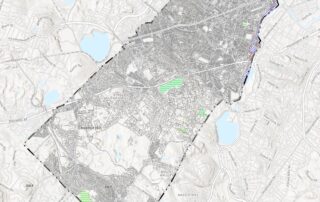 Map showing detailed streets, parks, and neighborhood boundaries within a highlighted section of a city.