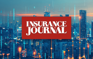Insurance journal logo over a modern digital city skyline