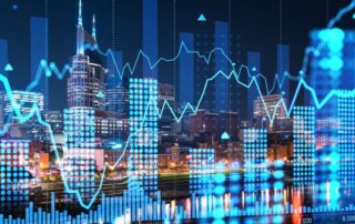 City skyline at night with overlaid digital financial charts and data visualizations